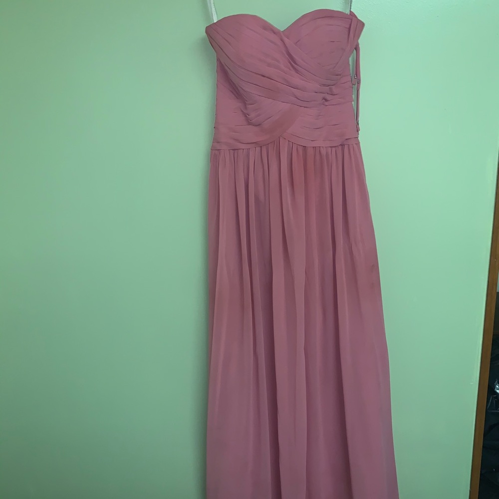 Long blush bridesmaid or wedding gown